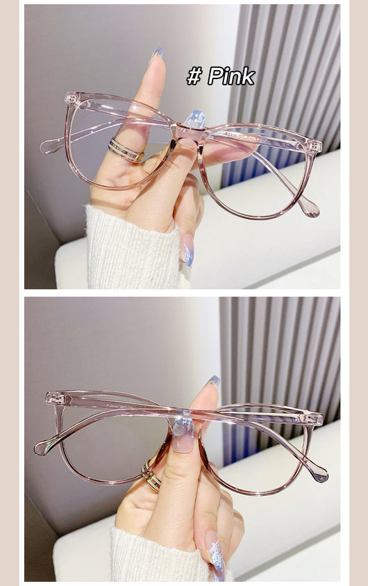 Black full-frame round anti-blue light glasses held by a hand with a gold ring and light blue gradient nails. - Image 28