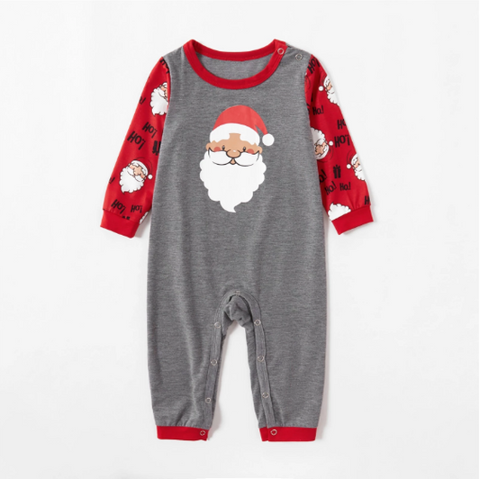 Children's grey and red long-sleeve pajama set with Santa Claus graphic on top and repeating Santa pattern on pants.