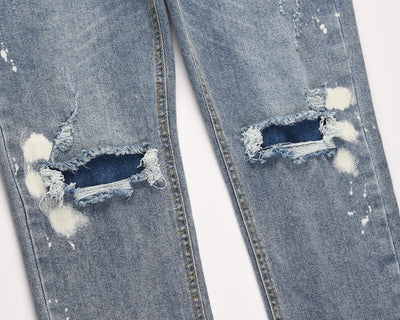 Jeans Azul Claro con Efecto Salpicado y Rotos Desgastados - Image 2