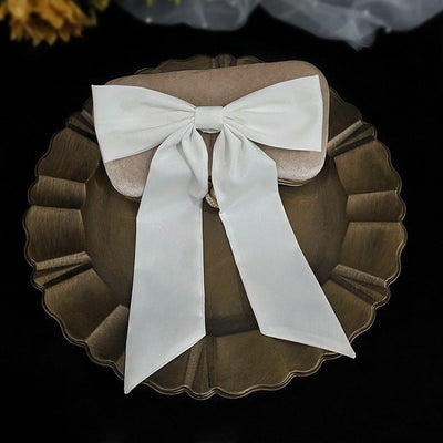 White birdcage veil with a cream satin bow and faux pearls, attached to a woven straw base, 80cm yarn length. - Image 18