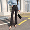 Pantalón Elegante Cintura Alta con Cortes Laterales