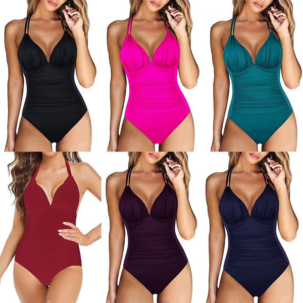 Teal halter one-piece swimsuit with a deep V-neck and ruched detailing on the bodice and sides.