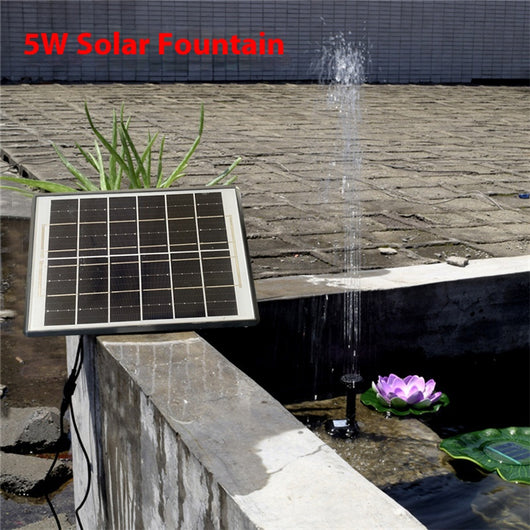 5W solar fountain kit with black solar panel on a ground stake, water pump, coiled hose, and various nozzles. - Image 3