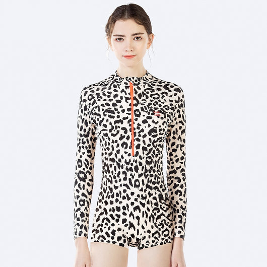 Child's long-sleeve leopard print swimsuit with a coral zipper and a matching swim cap on a white background. - Image 6