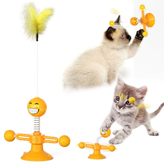 Yellow cat turntable windmill toy with a smiling face, spring, rotating arms, and a feather wand. Two kittens play with the toy. - Image 2