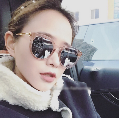 Black vintage square sunglasses for women with round blue mirrored lenses and gold-tone temple accents.