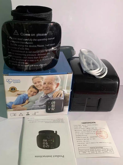 Black wrist sphygmomanometer with a digital display showing blood pressure and pulse readings, and a gray wrist cuff. - Image 9