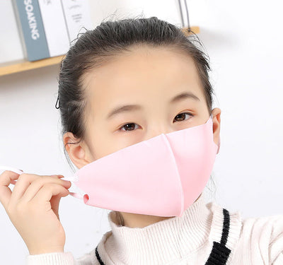 Woman wearing a light gray ice silk face mask with ear loops, suitable for summer and spring. - Image 6