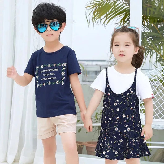 Navy blue short-sleeve t-shirt with a white floral-framed text print paired with light beige elastic-waist shorts. - Image 6