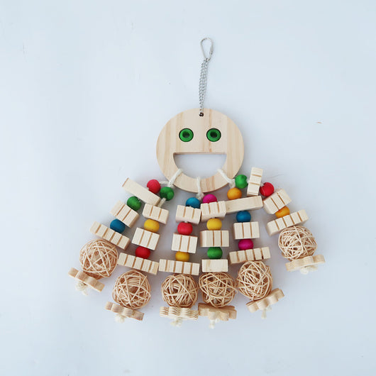 Natural wood parrot toy with a smiley face, colorful beads, wooden blocks, and rattan balls, hanging from a chain.