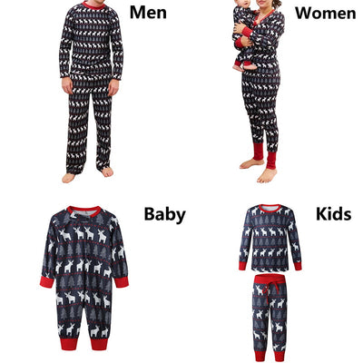 Family of four wearing matching red and white Christmas pajamas with reindeer and snowflake patterns, sitting with gifts. - Image 5