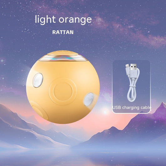 Sakura pink smart pet ball with automatic obstacle avoidance and luminous rotation, shown with its USB charging cable. - Image 4
