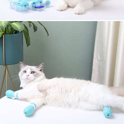 Four teal rubber cat paw covers with white hook-and-loop straps and paw print details, designed for anti-scratch protection. - Image 9