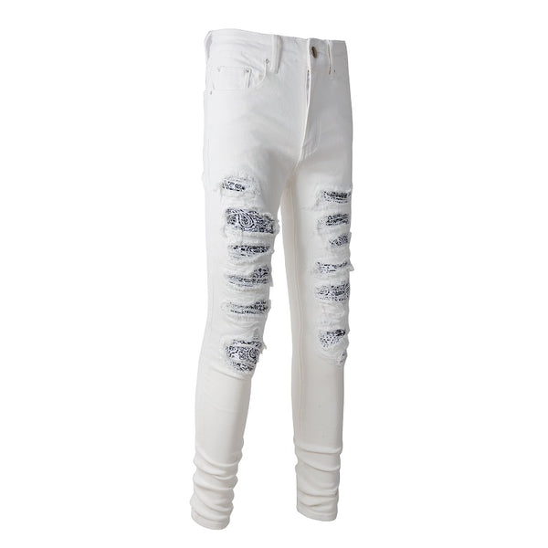 Jeans Rotos Blancos con Detalle de Flor de Marañón
