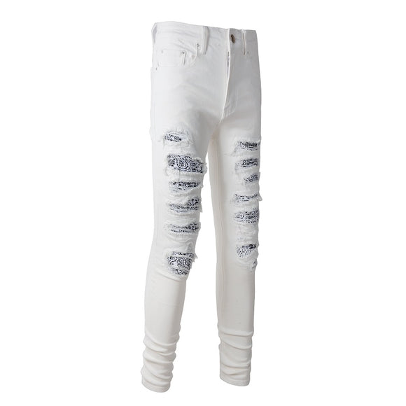 Jeans Rotos Blancos con Detalle de Flor de Marañón