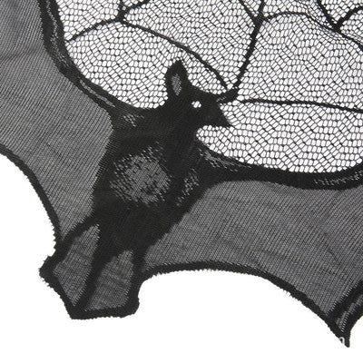Black lace Halloween curtain with a spider web pattern and a hanging bat figure, perfect for spooky decor. - Image 2