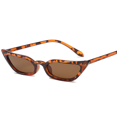 Red small frame cat-eye sunglasses with red tinted lenses on a white background. - Image 10