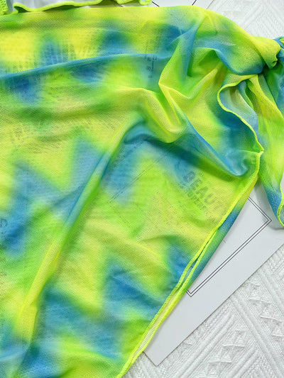 Vibrant green and blue tie-dye bikini set with a matching sarong cover-up, featuring halter top and tie-side briefs. - Image 6
