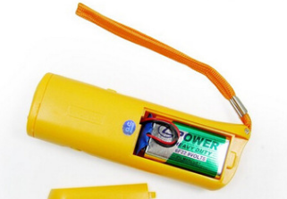 Yellow and black ultrasonic dog training devices with wrist straps, one in retail packaging. - Image 4