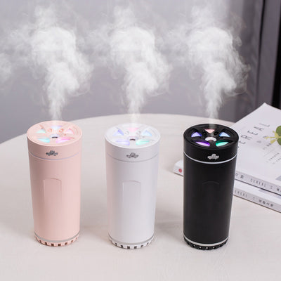 Gray cylindrical USB aromatherapy humidifier with a silver band and car icon on top, designed for car use. - Image 9
