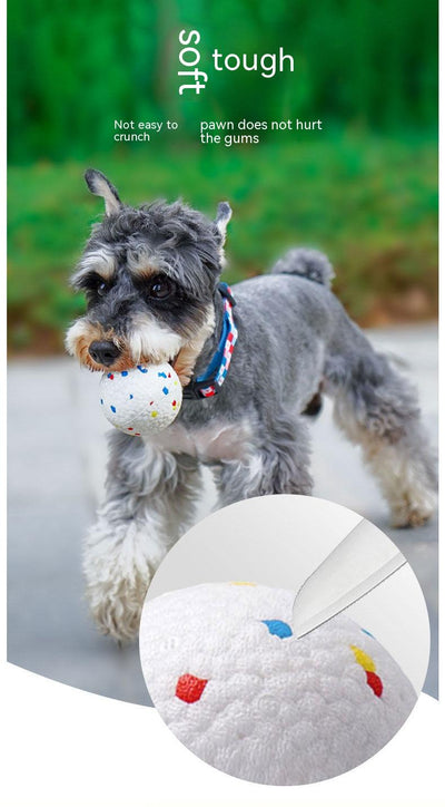 White bone-shaped dog toy with colorful speckles, labeled as interactive and bite-resistant. - Image 13
