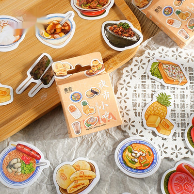 Box-packed set of 46 retro-style night market snack stickers, featuring illustrations of various foods and drinks.