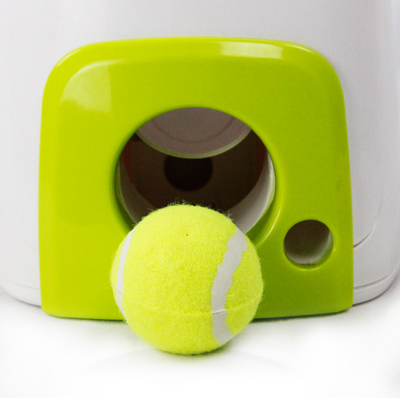 AFP Fetch'N Treat interactive dog toy, a white and green machine that dispenses treats with a tennis ball. - Image 9