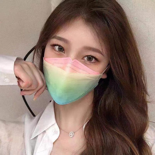 A hand holds a fan of six willow-shaped face masks in pastel gradient colors, including blue, pink, yellow, purple, and white.