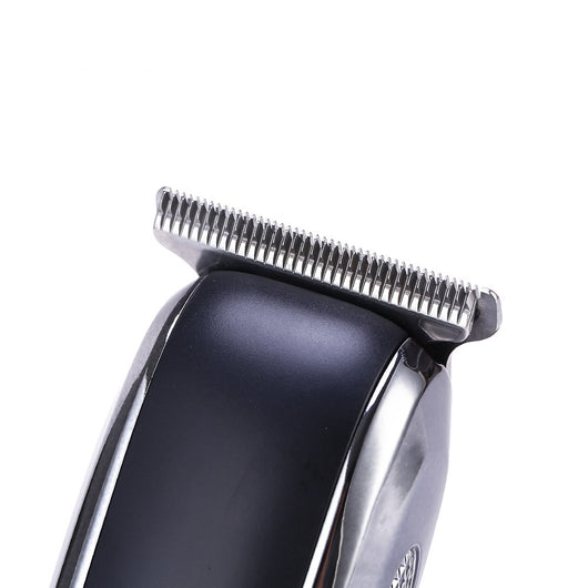 VGR V-020 professional black and silver rechargeable beard trimmer kit with 1mm, 2mm, 3mm guide combs, USB cable, cleaning brush, and oil. - Image 4