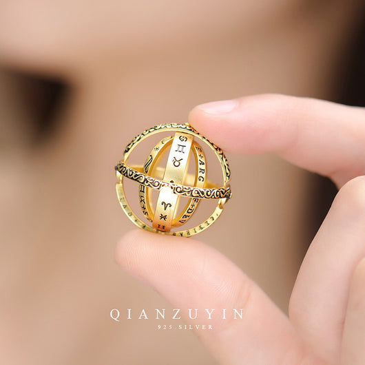 Anillo Universo Giratorio con Bola Astronómica - Diseño Retro para Parejas - Image 9