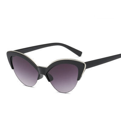 Purple cat-eye sunglasses with translucent frames and purple lenses, featuring a silver-tone accent. - Image 15
