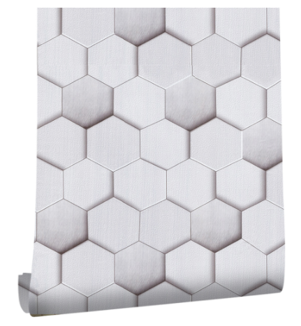 Roll of peel and stick wallpaper with a white and light gray geometric hexagonal pattern, creating a 3D effect.