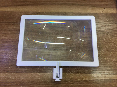 White and black AR somatosensory gamepad with a smartphone mounted, displaying an augmented reality game. - Image 5