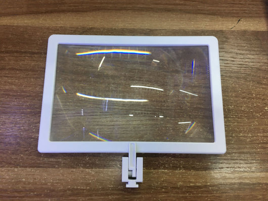 White and black AR somatosensory gamepad with a smartphone mounted, displaying an augmented reality game. - Image 5