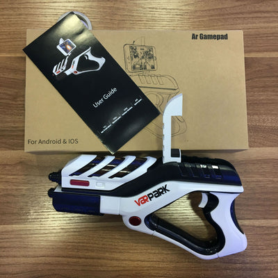 White and black AR somatosensory gamepad with a smartphone mounted, displaying an augmented reality game. - Image 3