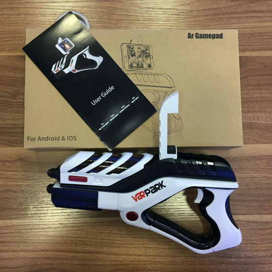 White and black AR somatosensory gamepad with a smartphone mounted, displaying an augmented reality game. - Image 3