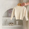 Blusa Tejida para Bebé Niña con Cuello Hueco y Detalle Stringy