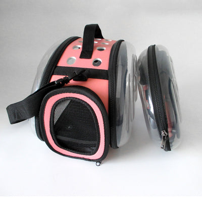Gray and black pet carrier with a clear bubble window featuring paw prints and a mesh side for ventilation. - Image 4