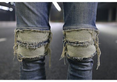 Jeans ajustados con rotos diseñados - Image 4