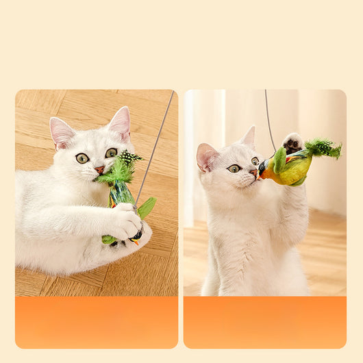 Colorful bird cat toy with green fluffy wings, black head, yellow face, orange beak, and spotted tail feathers. - Image 12