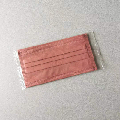 Light pink disposable face mask with white ear loops, featuring pleats for a comfortable fit. - Image 5