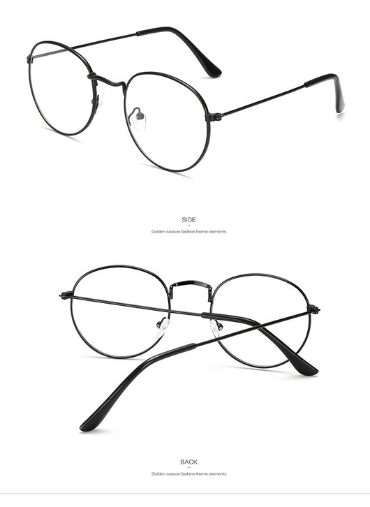 Retro oval anti-blue light glasses with a dark metal frame and clear lenses on a white background. - Image 13