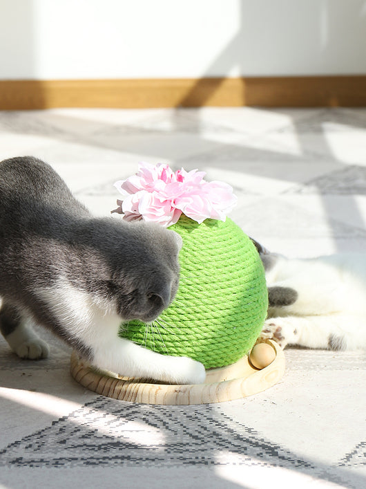 Green rope cat scratching toy shaped like a cactus with a pink flower on top, sitting on a light wood base. - Image 7