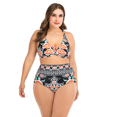 Plus size two-piece swimsuit with a black base, colorful geometric pattern, criss-cross top, and high-waisted bottom. - Image 35