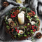 Candelabro navideño con corona decorativa