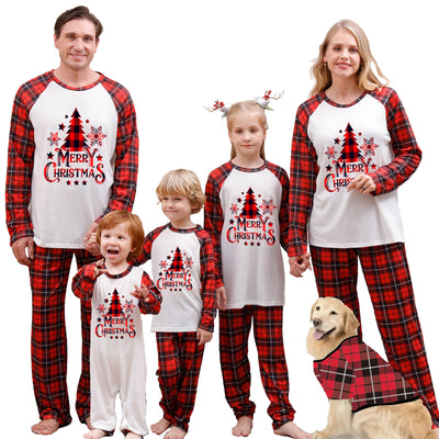 Family of four wearing matching green plaid Christmas pajamas with "Merry Christmas" and Christmas tree print. - Image 2