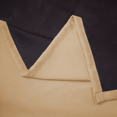 Close-up of a navy blue blackout curtain, showcasing the fabric texture and the black lining on the back. - Image 9