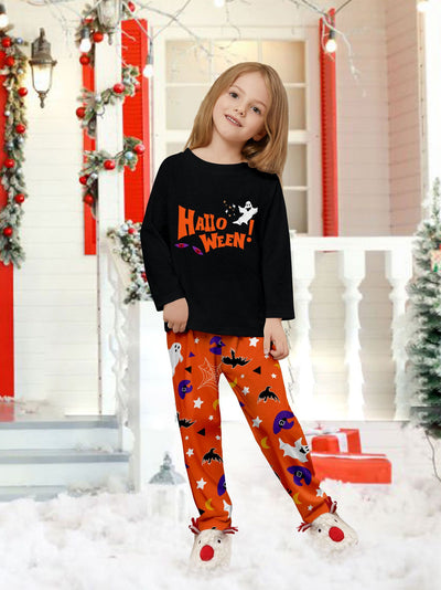 Family of four wearing matching black and orange Halloween long-sleeve pajamas with ghost and bat prints. - Image 11