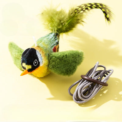 Plush bird cat toy with orange chest, grey body, feathered tail, and an elastic string for interactive play.