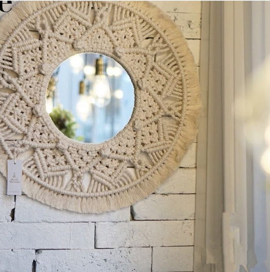 Circular mirror with a beige macrame fringe border, featuring intricate knotwork around the reflective surface. - Image 5